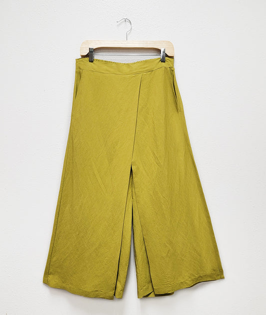 lime wide leg pant with an overlapping panel in the front from each leg