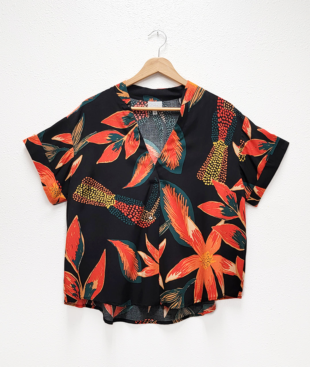 black print top on a light background
