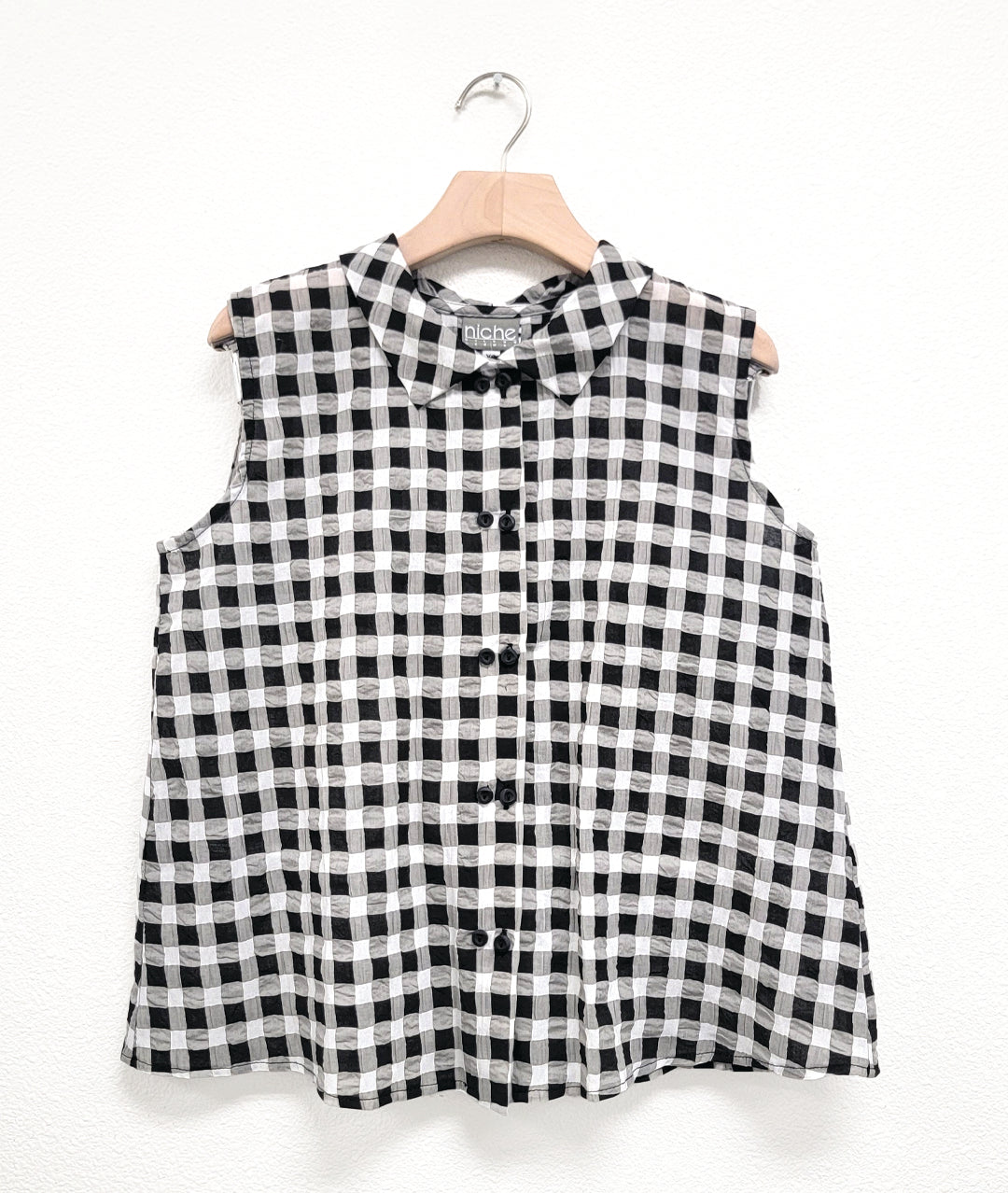 black and white plaid print sleeveless button down blouse