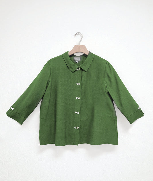 green button down blouse with 3/4 sleeves, a boxy body and a twin button detail