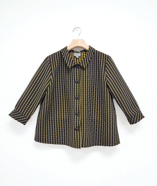 black and yellow check print button down blouse with 3/4 sleeves and a twin button detail