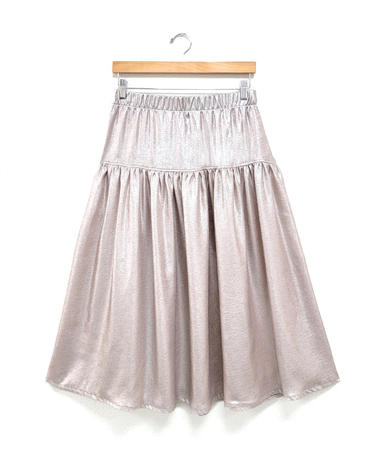 shiny pearl color skirt with a dropped gather and an elastic waist