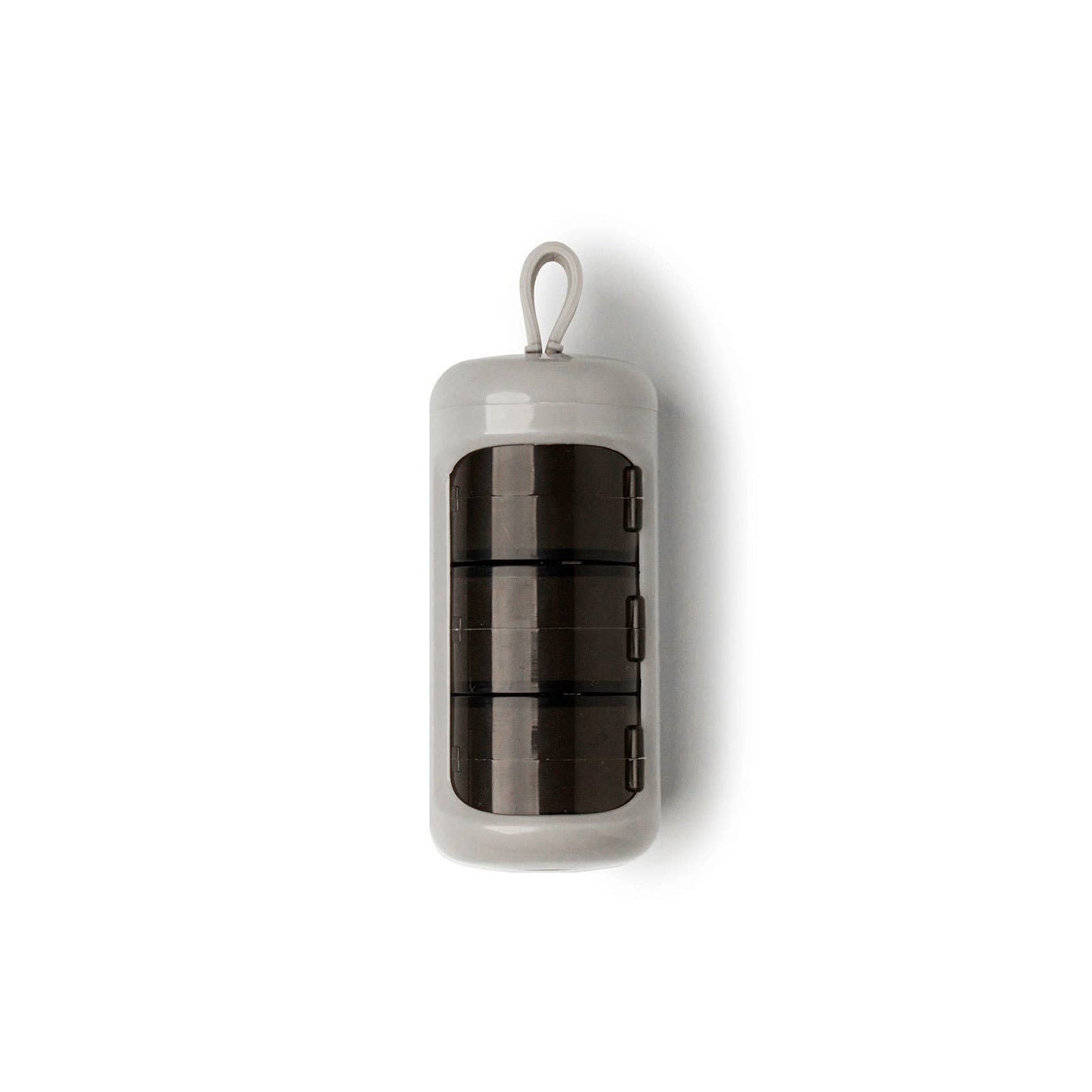 grey vitamin pod against a white background