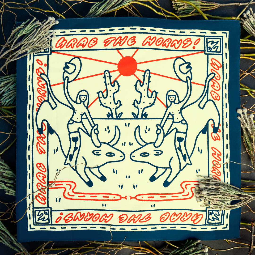 A bandana with a graphic print featuring two stylized characters and the text 'GRAB THE HORNS!