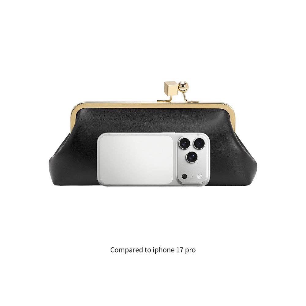 A black kiss-lock clutch bag with a gold-tone metal frame and clasp, shown holding a silver smartphone to demonstrate fit. The text 'Compared to iphone 17 pro' is written below on a plain white background.