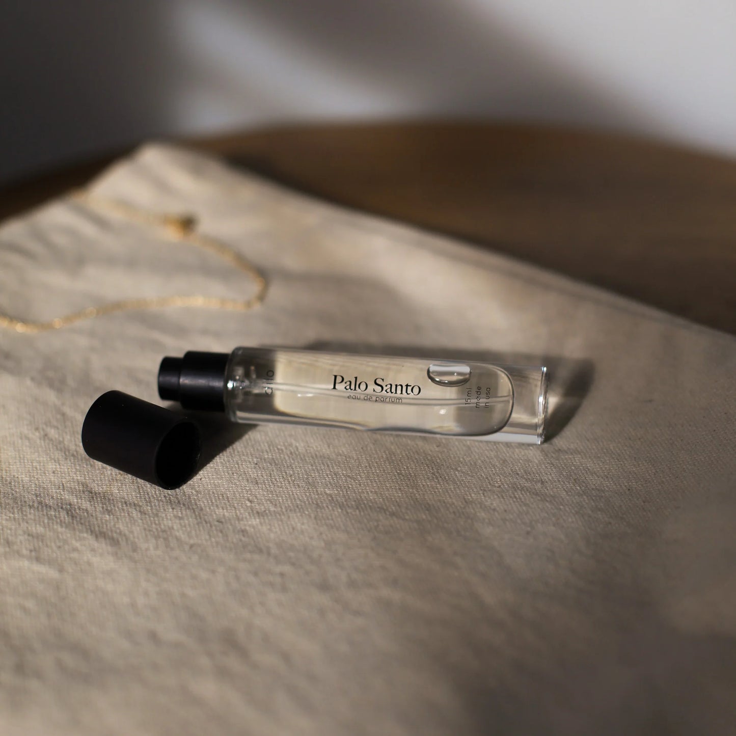 palo santo scented perfume bottle