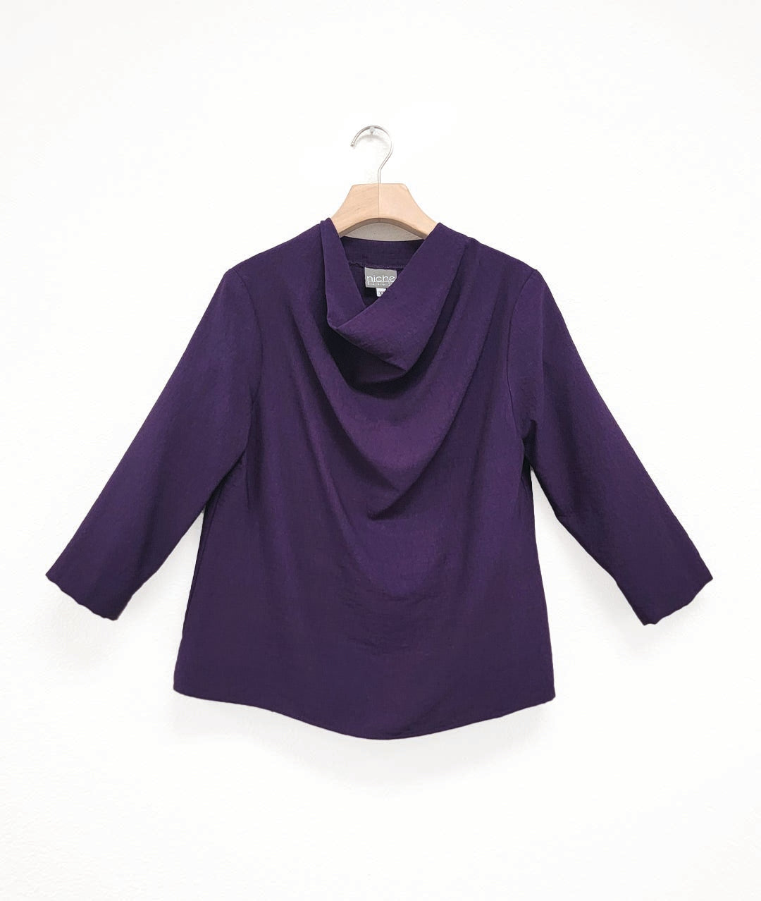 deep eggplant color pullover top with 3/4 sleeves and a high cowl neckline