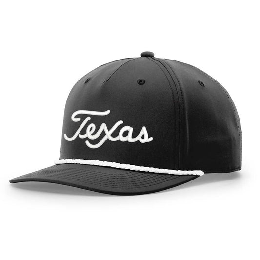 black hat with white rope across cap and embroidered "Texas" script in white