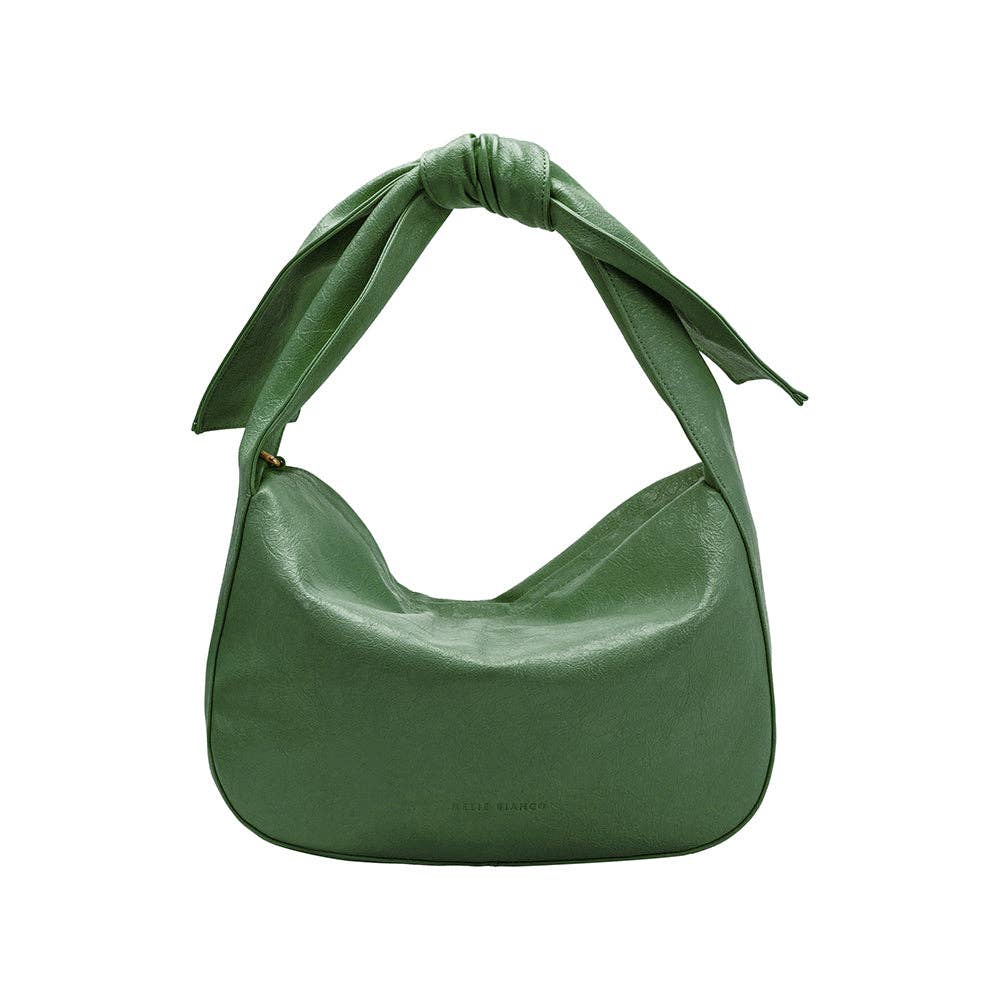 Green handbag with a bow strap on a white background