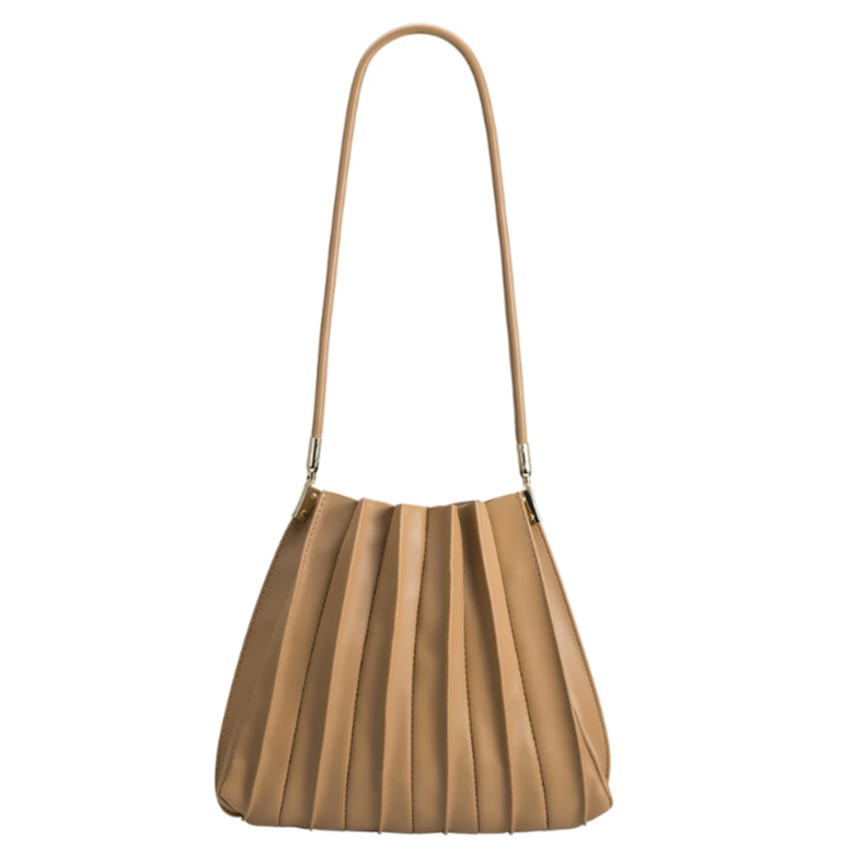 rounded taupe handbag with a long strap and a pleated detail