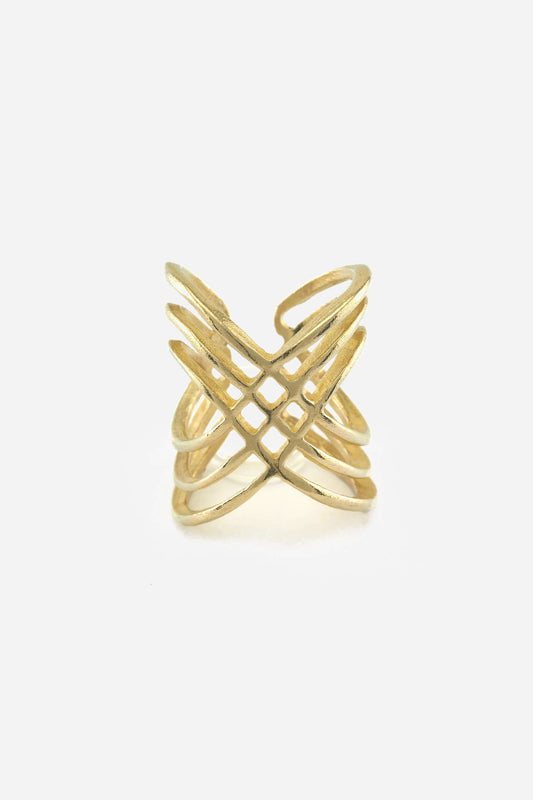 gold abstract ring against a white background