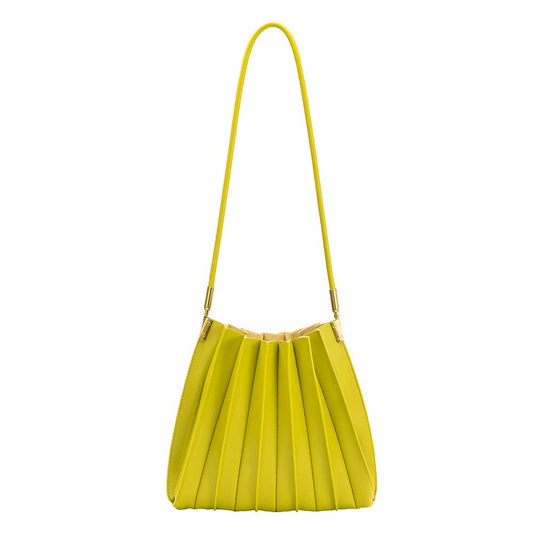 pistachio green pleated shoulder bag against a white background
