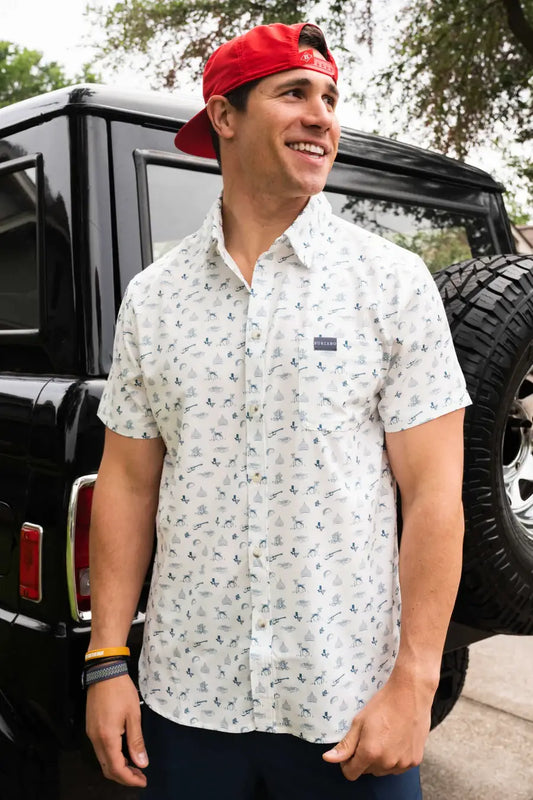 male model wearing a white patterned shirt