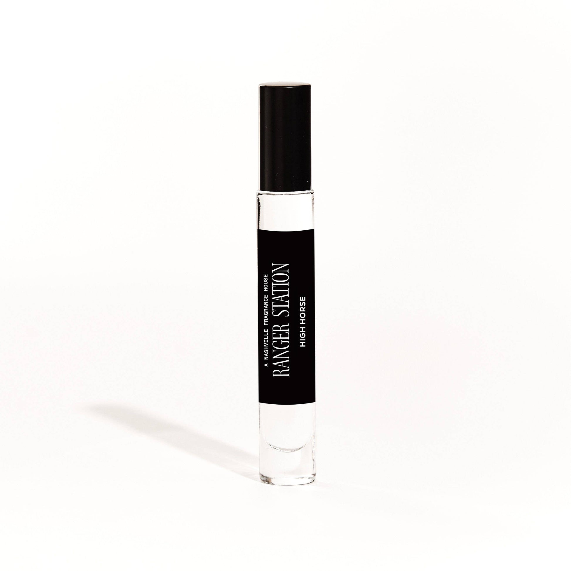 A 10ml bottle of High Horse Quickdraw unisex perfume with a black spray top, labeled with the brand name and product title.