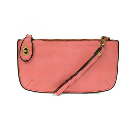 coral colored wristlet bag