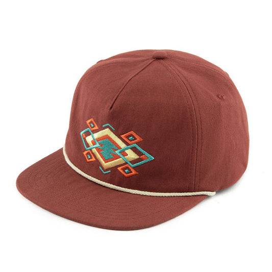 rust colored baseball cap with aztec design and braided trim on crown