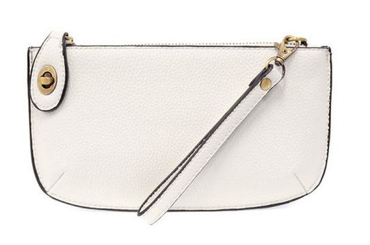 Pictured is a small white crossbody clutch