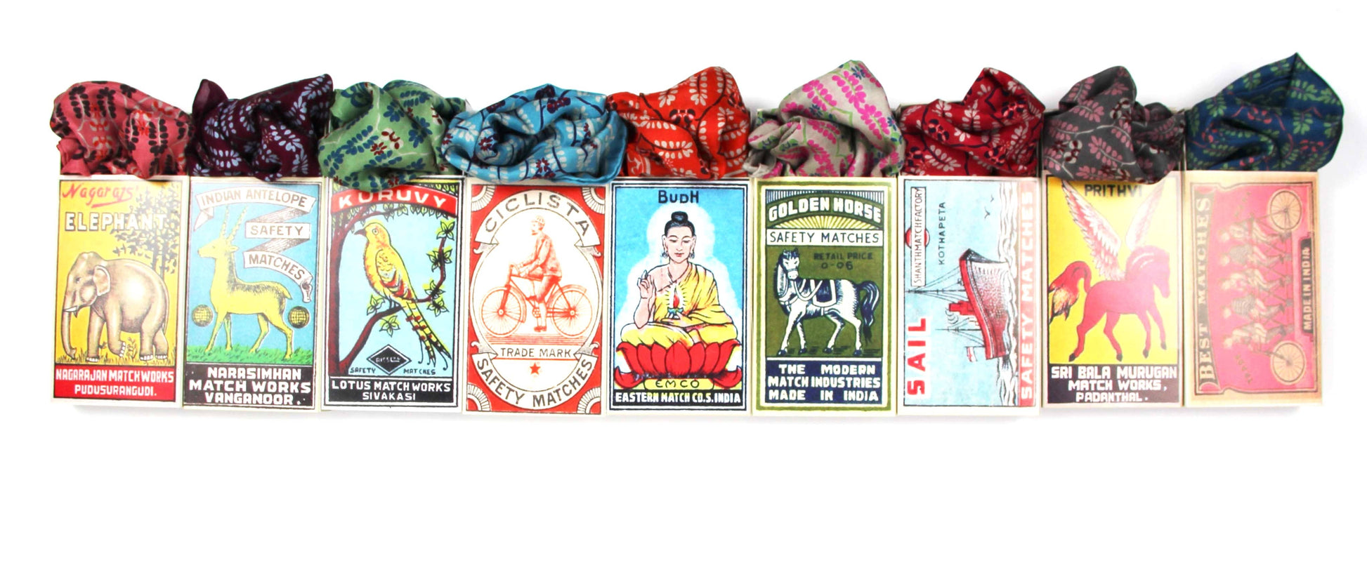 Colorful packages with various designs and text on a white background