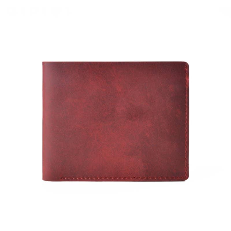 front of red leather wallet against white background