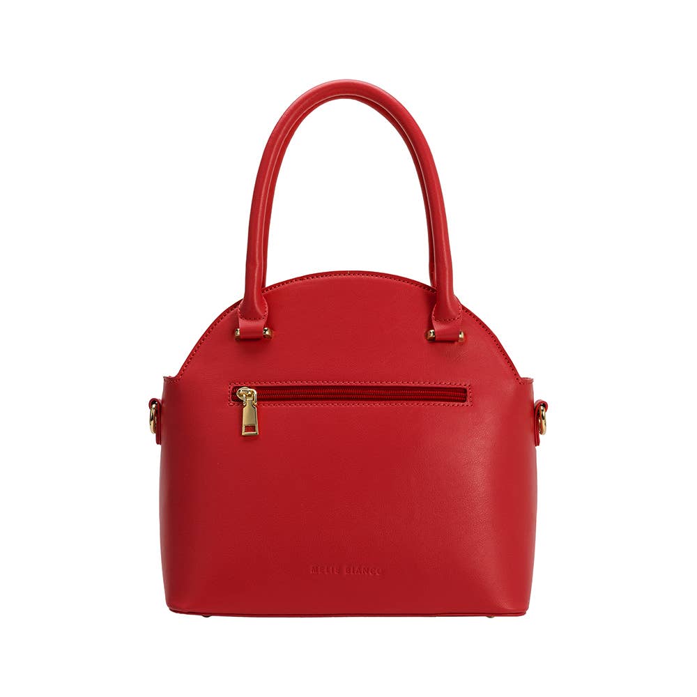 back view of red handbag showing zipper pocket on white background