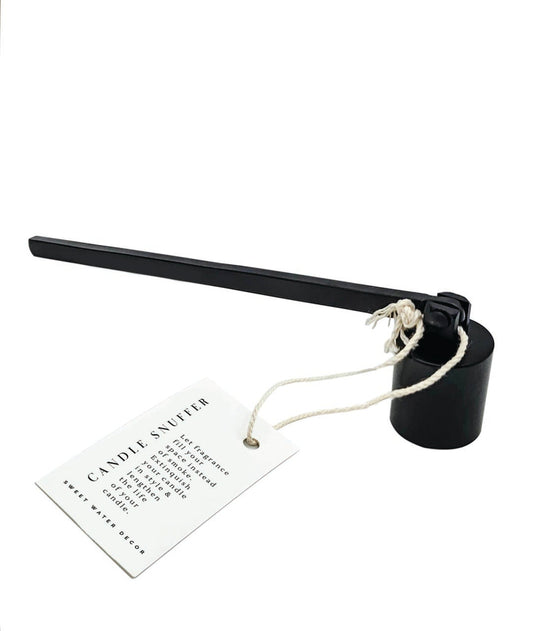 candle snuffer against a white backdrop