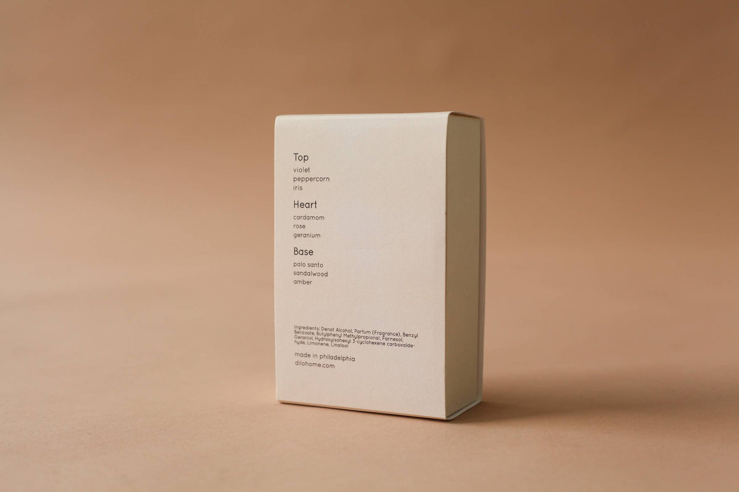 White rectangular box with text on a beige background