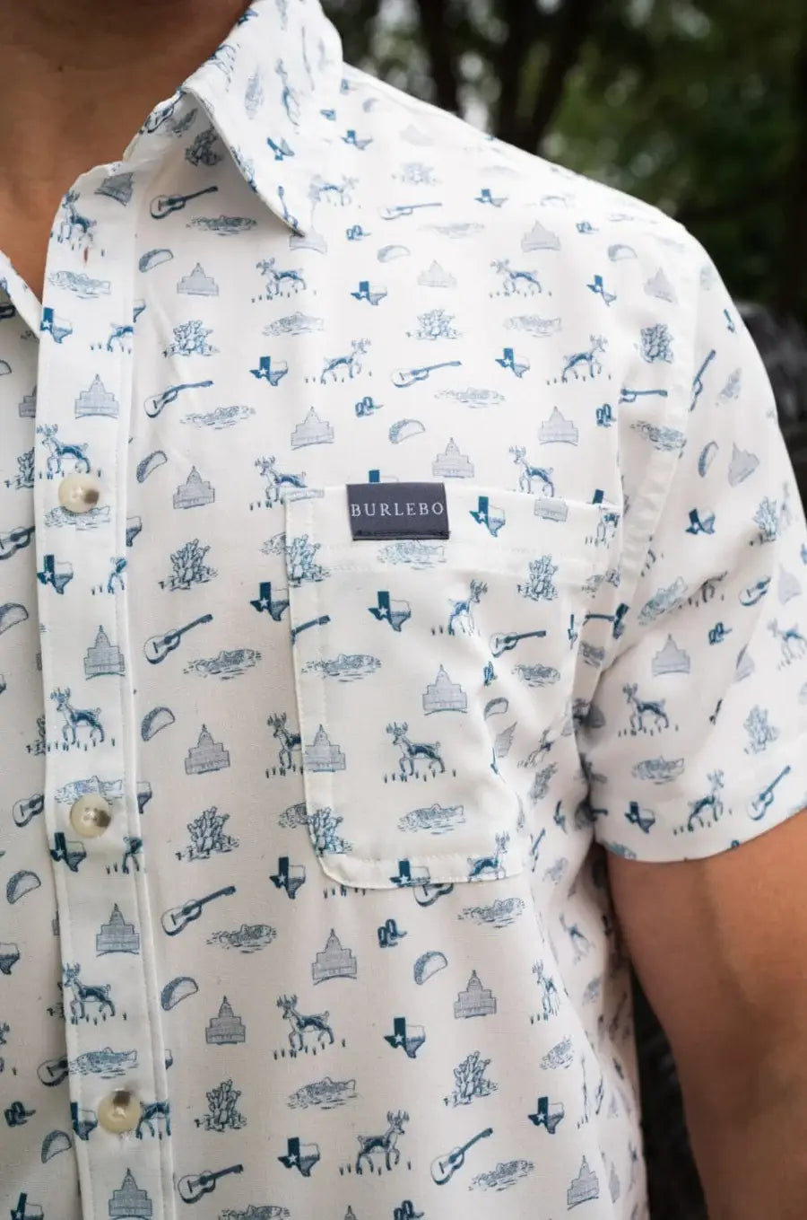 close-up of shirt patterned with southern texas landmarks