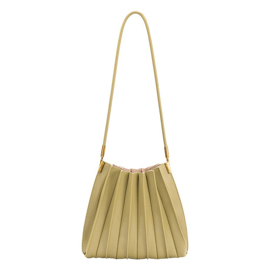 Beige pleated handbag with a strap on a white background