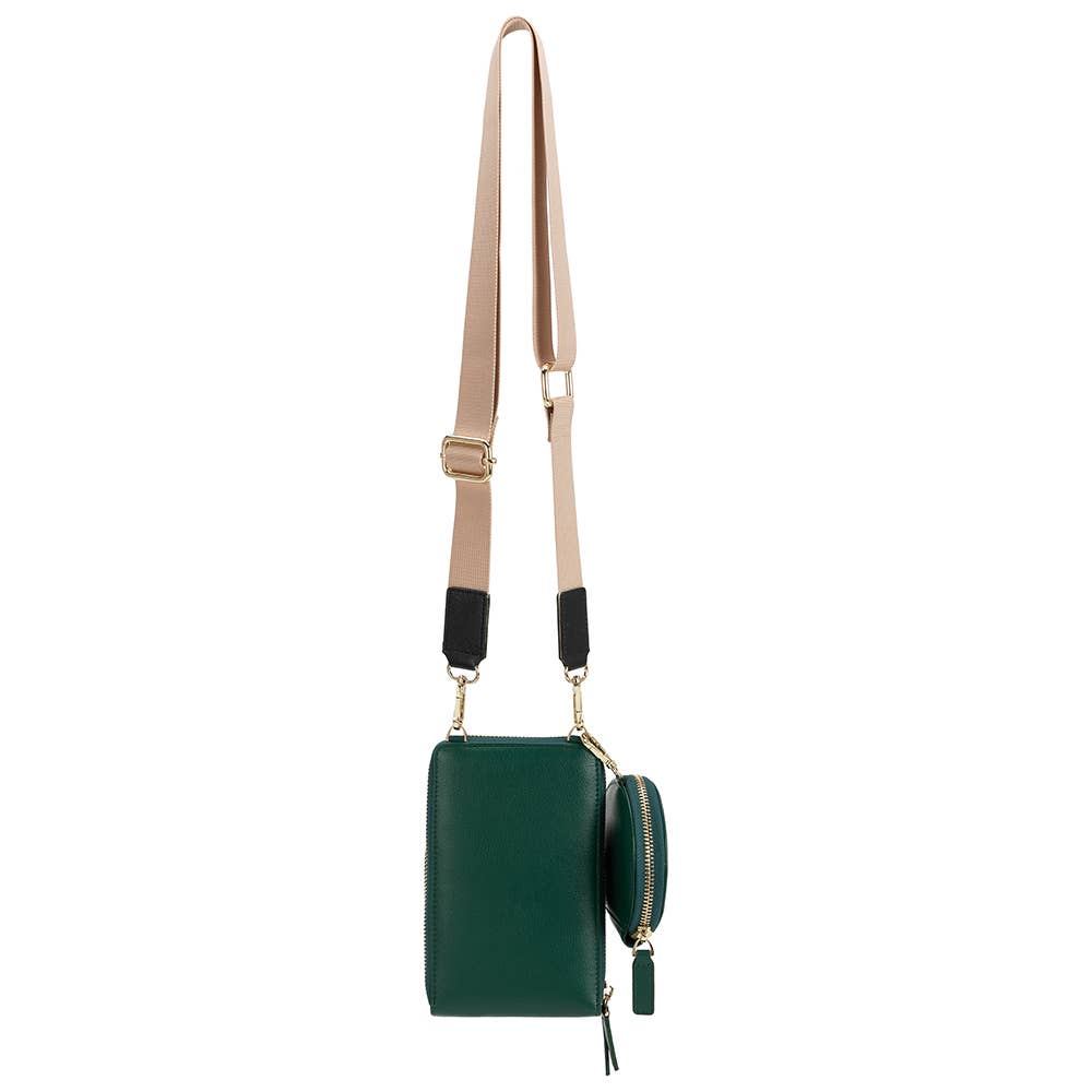 back view of green crossbody against white backdrop