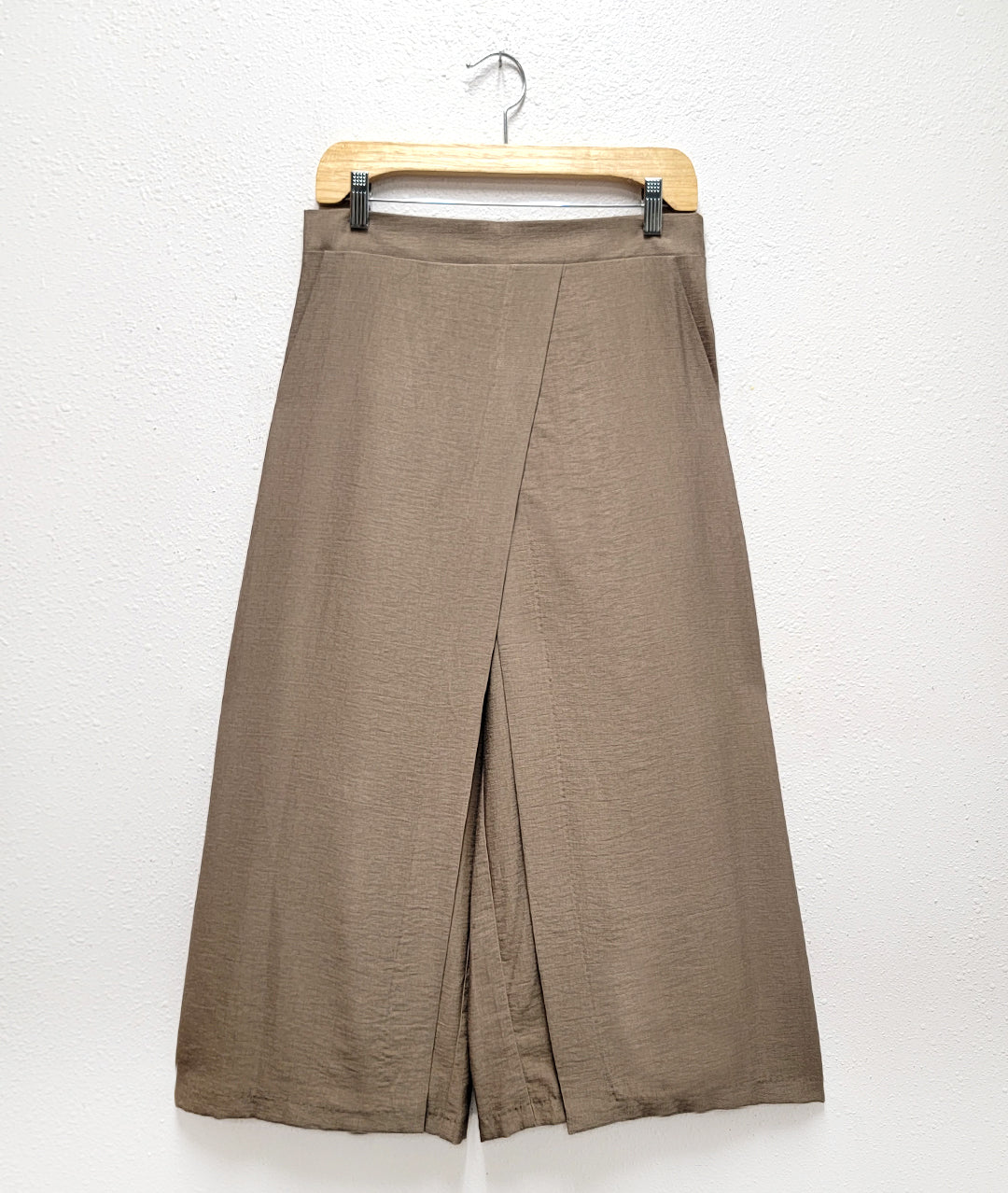 wide leg khaki color pant with an overlap panel in the front