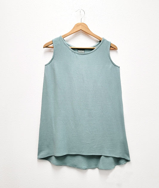 light blue tank with a lower hem in back