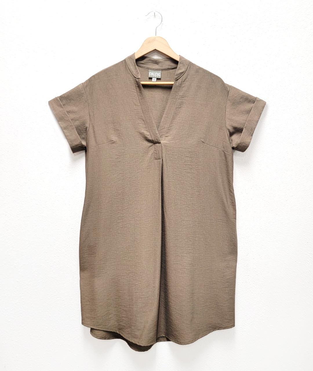 boxy pebble brown dress with short cuffed sleeves and a vneck
