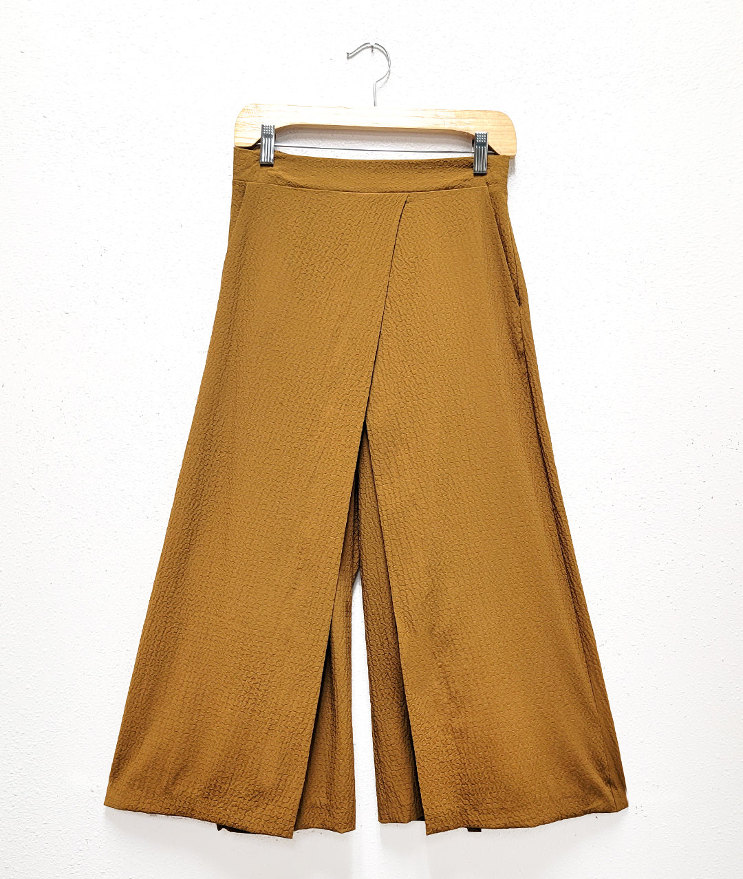 wide leg dijon yellow pant with an overlapping layer on either leg, creating a skirt look