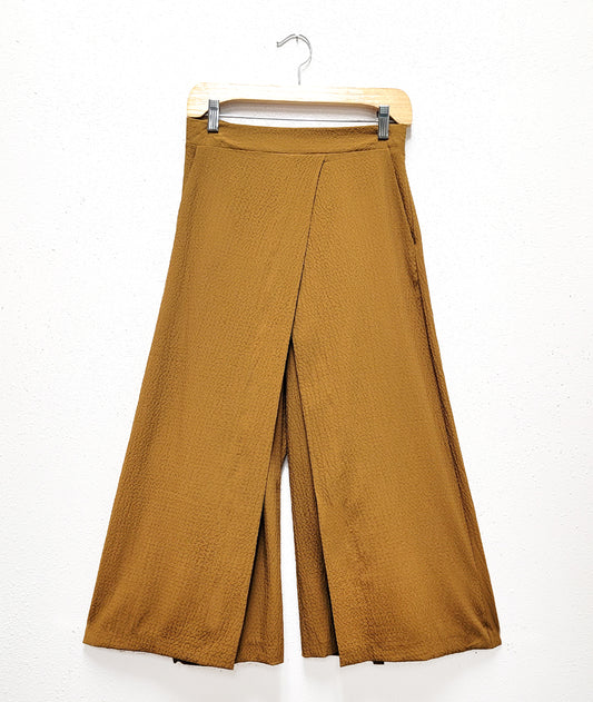 wide leg dijon yellow pant with an overlapping layer on either leg, creating a skirt look