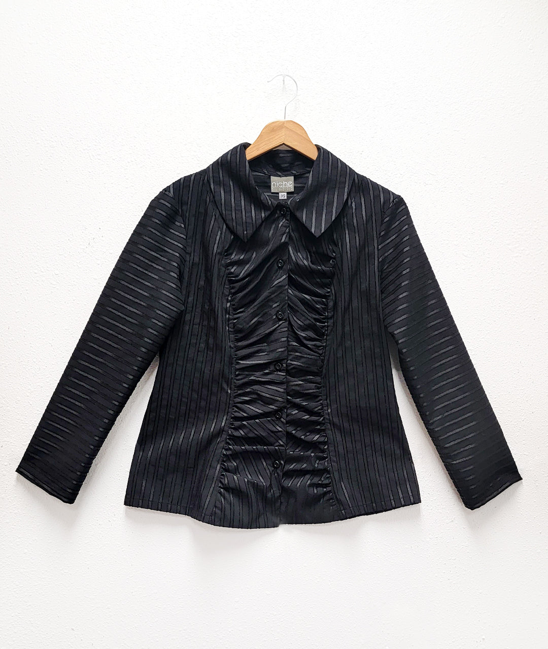 black on black striped blouse with a gathered detail up the center front along princess seams