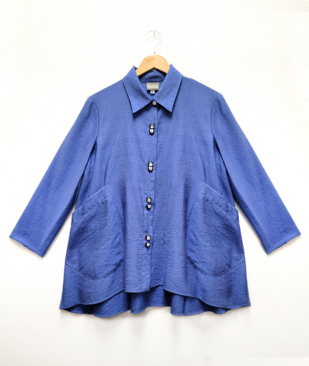 swingy periwinkle color button down blouse with large hip pockets
