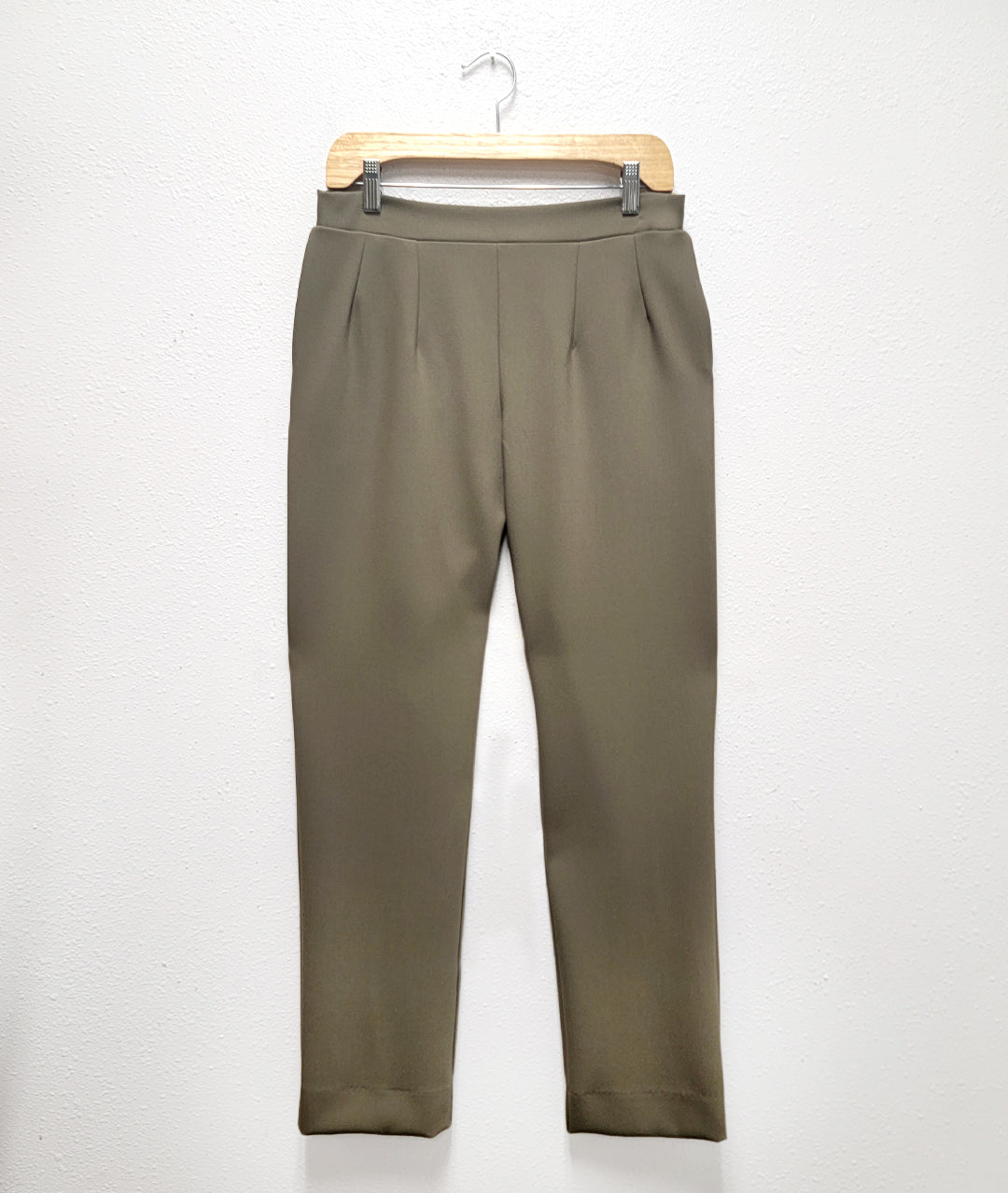 sage green straight leg pant with a flat front and darts