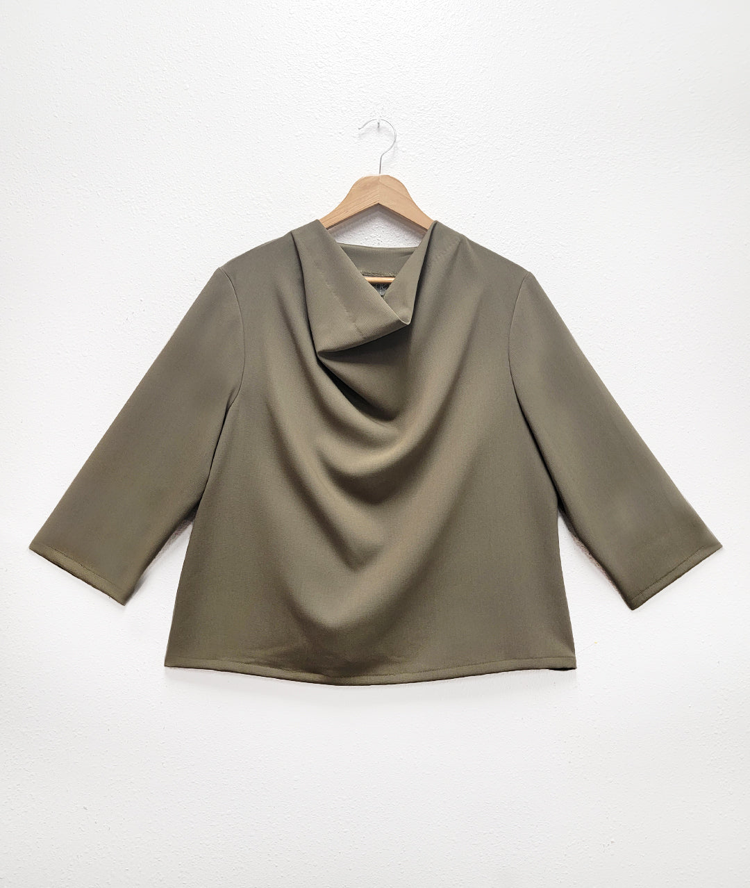 sage green boxy pullover top with a soft cowl neckline