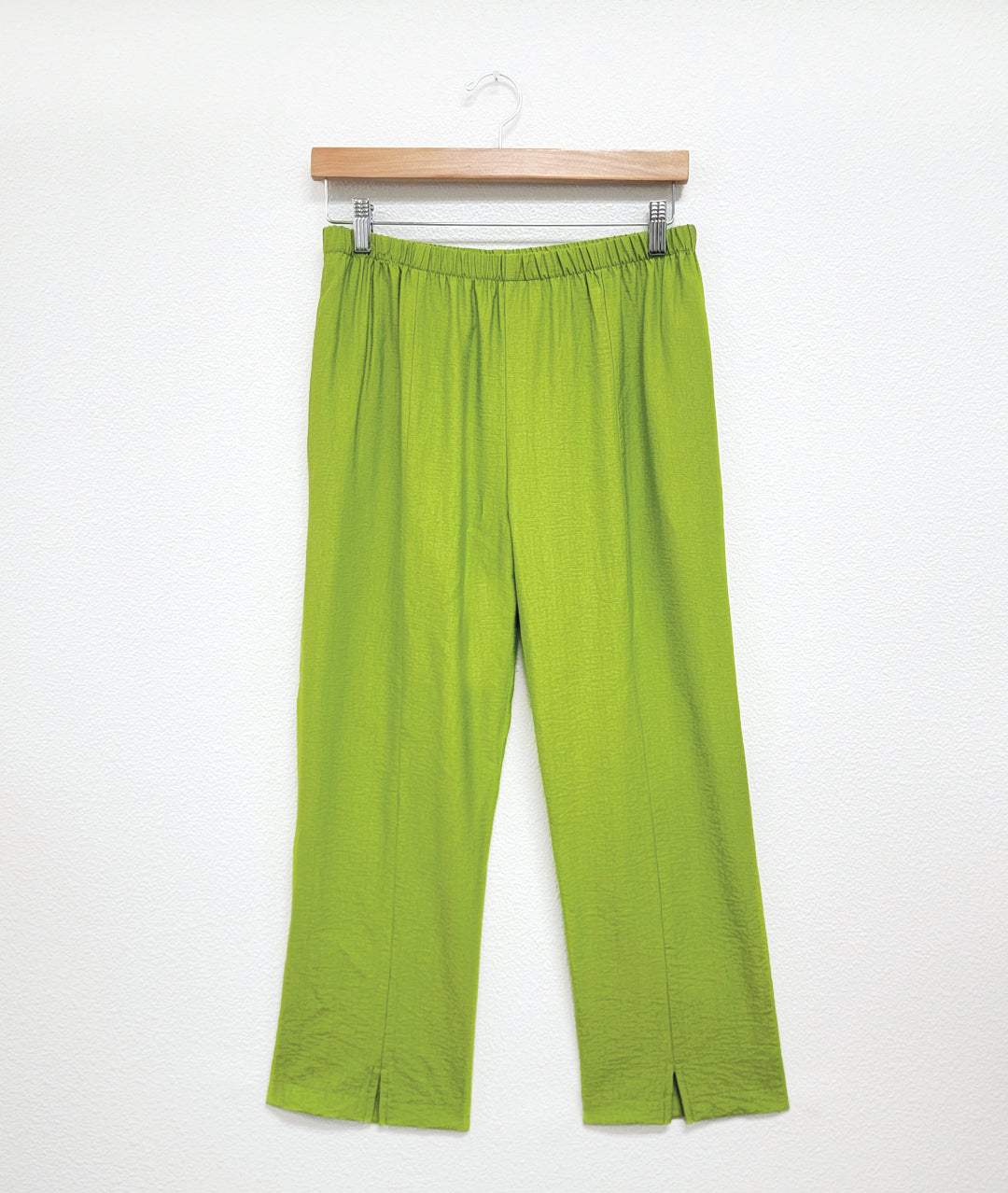 lime straight leg pant with an elastic waistband and a center front seam on each leg, ending in a split at the ankle