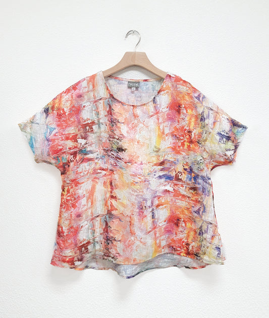 pullover top with short sleeves, in a multi color paint stroke print