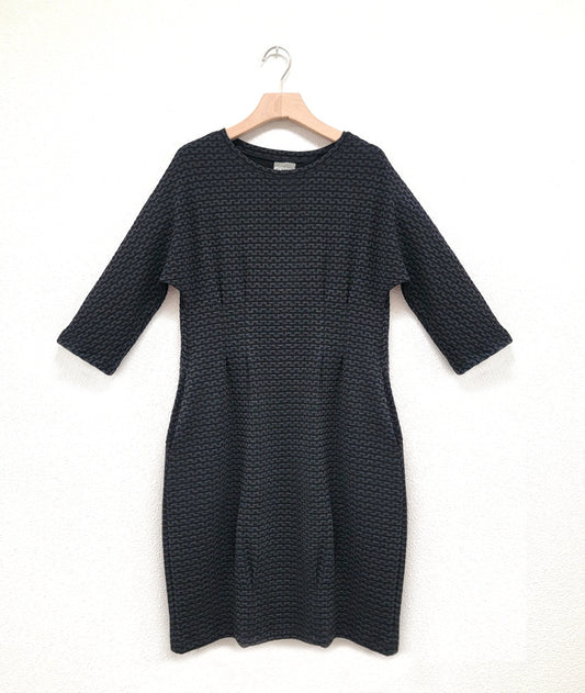 black and grey zipper print knit dress with 3/4 sleeves, pockets and shaping darts at the waist