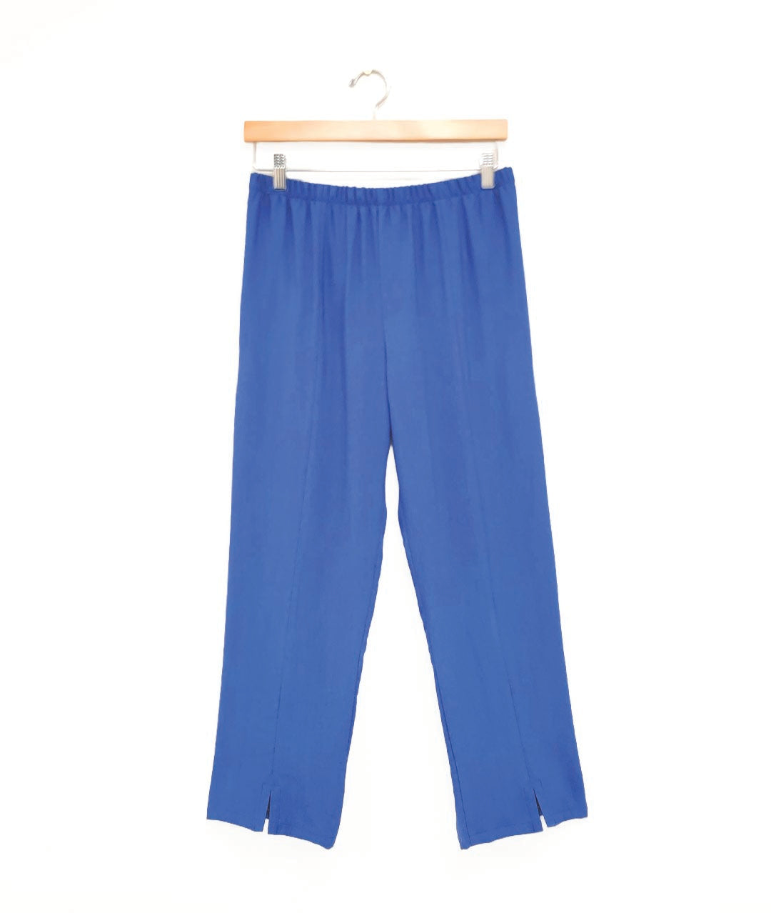 blue pant with a straight leg, center front seams, and a small split at each ankle
