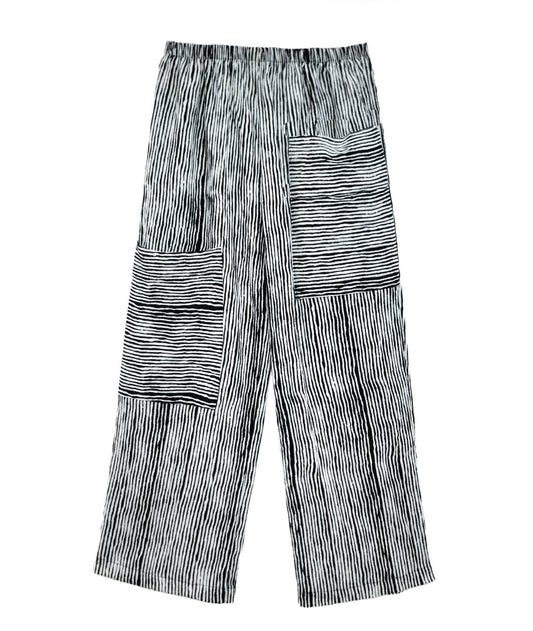 black and white striped pants with asymmetrical cargo pockets