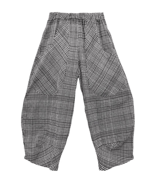 black, white and grey plaid pants with oversized contrasting pockets, wide legs and a tapered ankle.