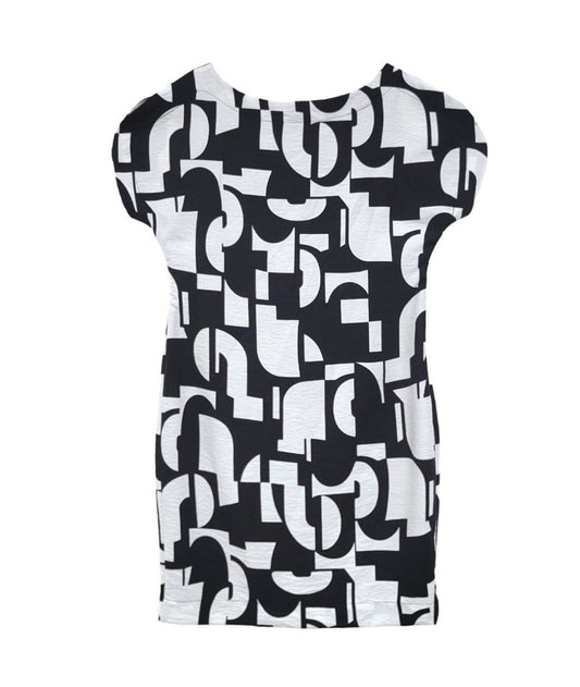 black and white shift dress with a mod geometric print. dress is knee length with a round neckline and a split cap sleeve