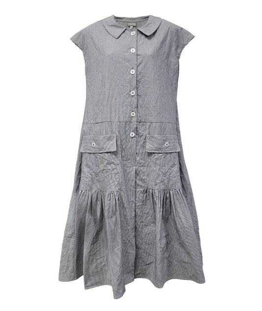 grey and white pinstriped button down dress with a dropped waist, cap sleeves, squared hip pockets and contrasted red stitching at the buttons.