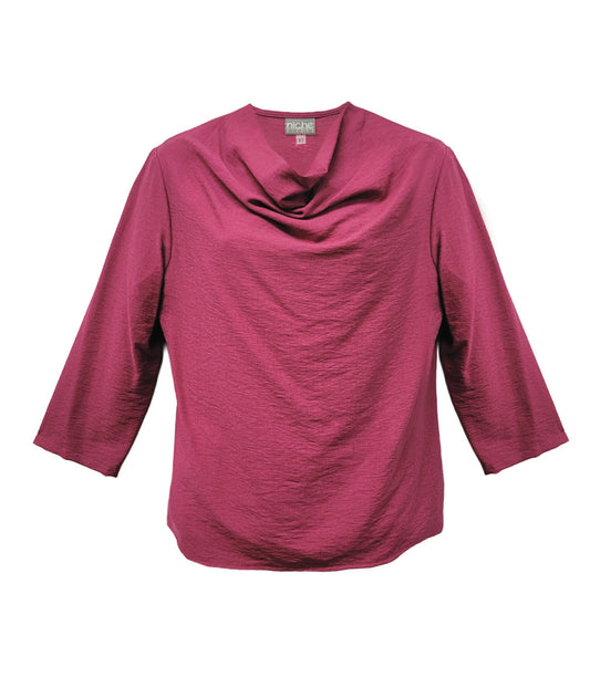 pink cowl-neck top on a white background