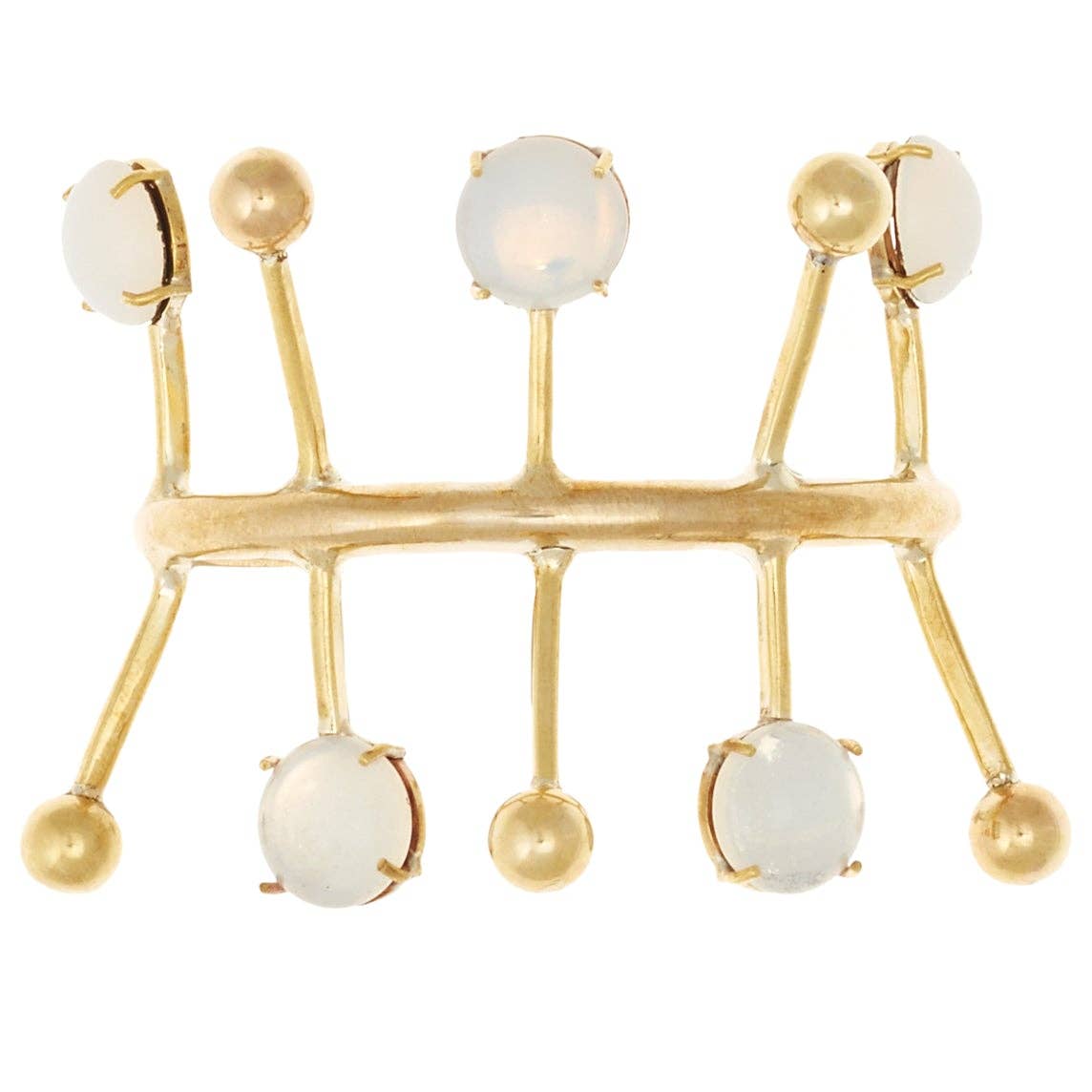 A gold-toned geometric cuff bracelet featuring five round, milky white gemstone accents set in gold, displayed on a clean white background.