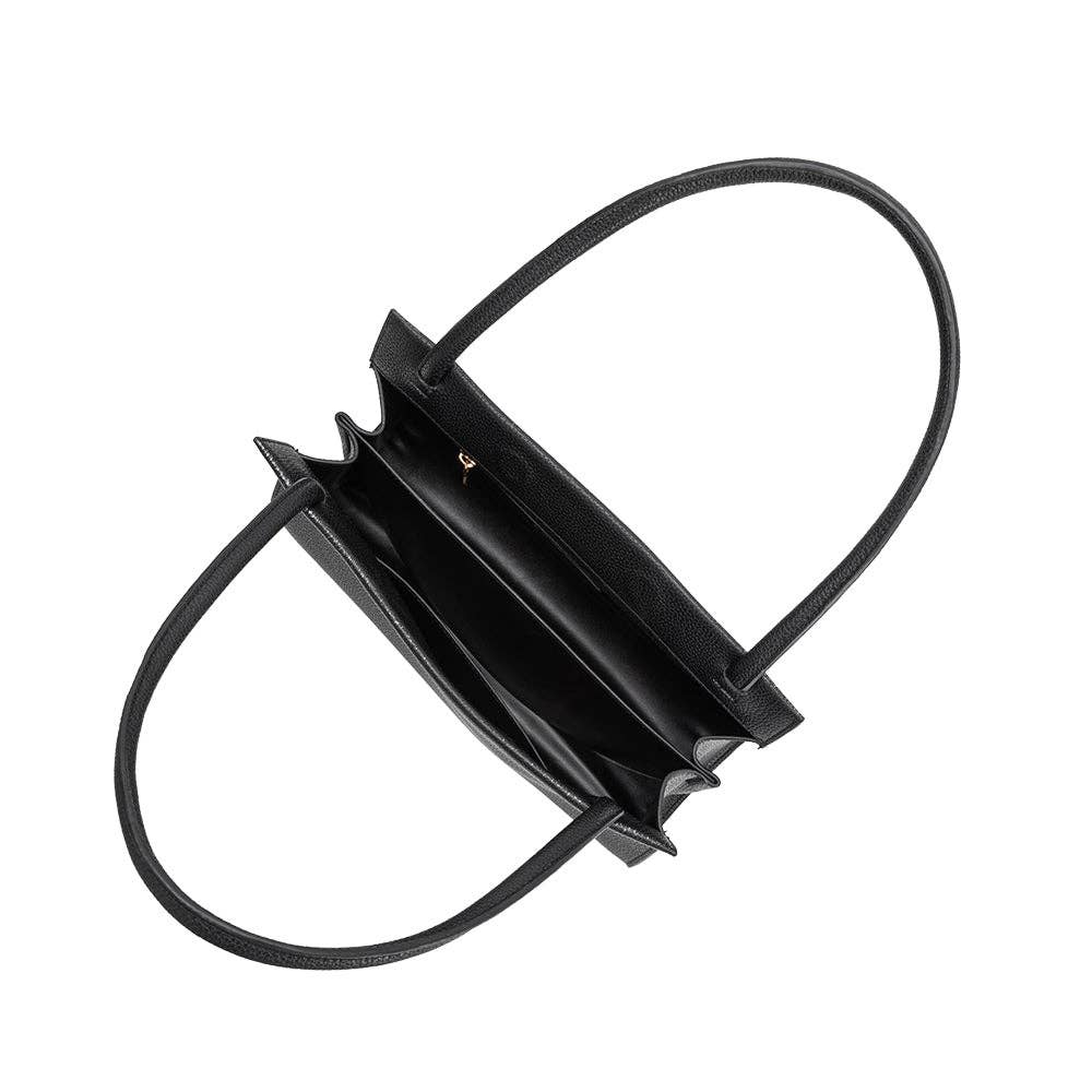 Black handbag with a strap on a white background
