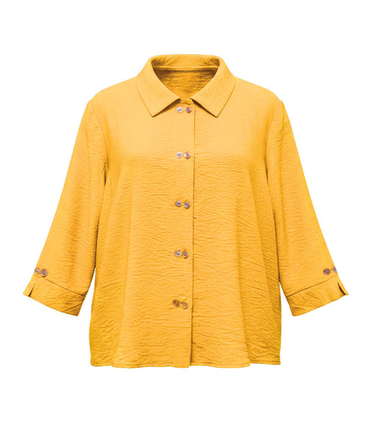 Yellow shirt with buttons on a white background